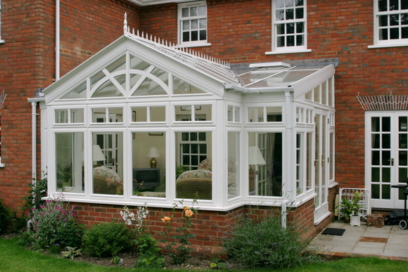 Gable front conservatory Conservatory in hardwood with sunburst effect gable